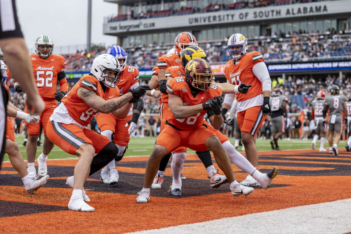 Brevyn Spann-Ford celebrates his touchdown catch